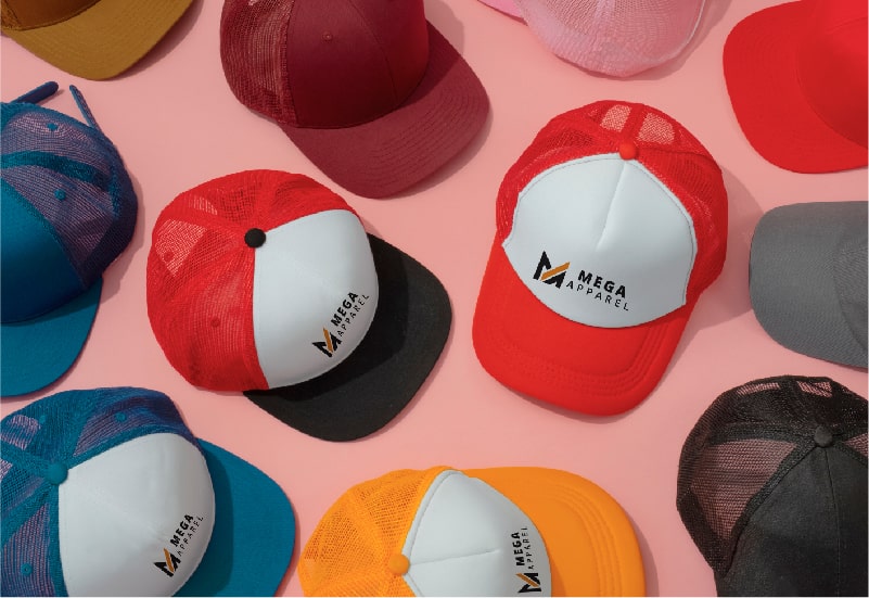 A collection of cut-and-sew hats, including baseball caps, fedoras, and beanies