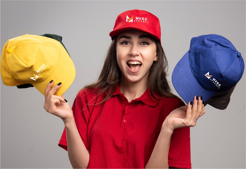 A Woman is holding custom caps in different colors in her hands