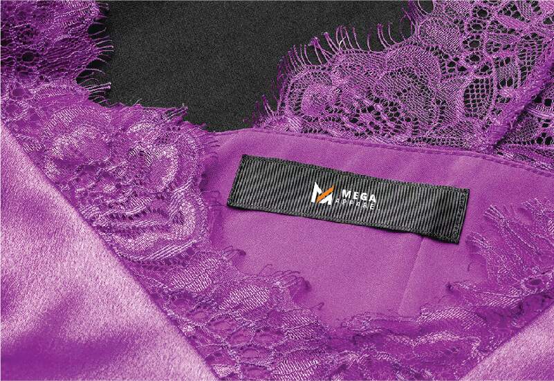 Purple lingerie garment with a lace overlay and a black label that says 'Mega Apparel' 